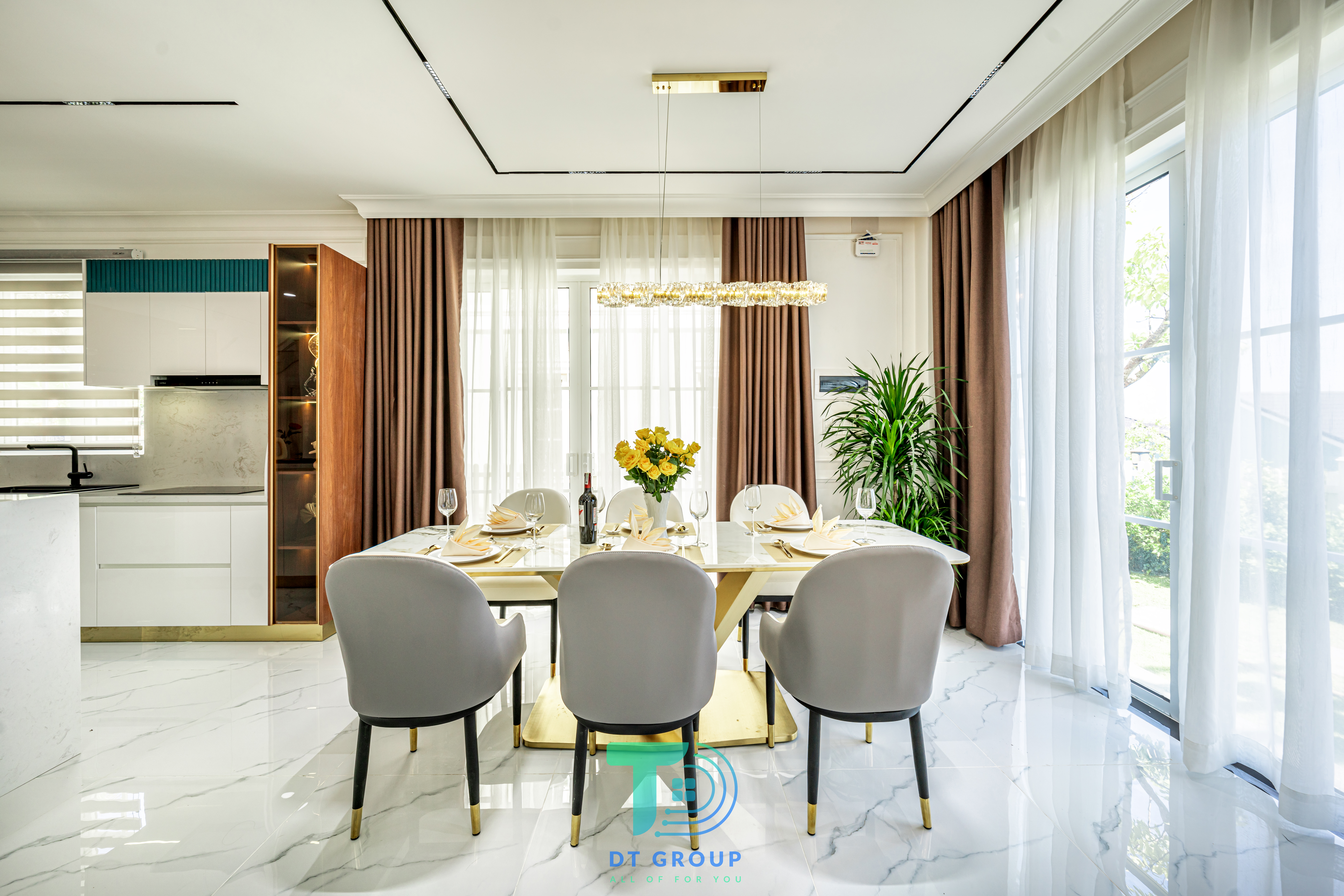 Phòng khách nội thất hiện đại cao cấp với sofa nhung xanh và đèn chùm tinh tế